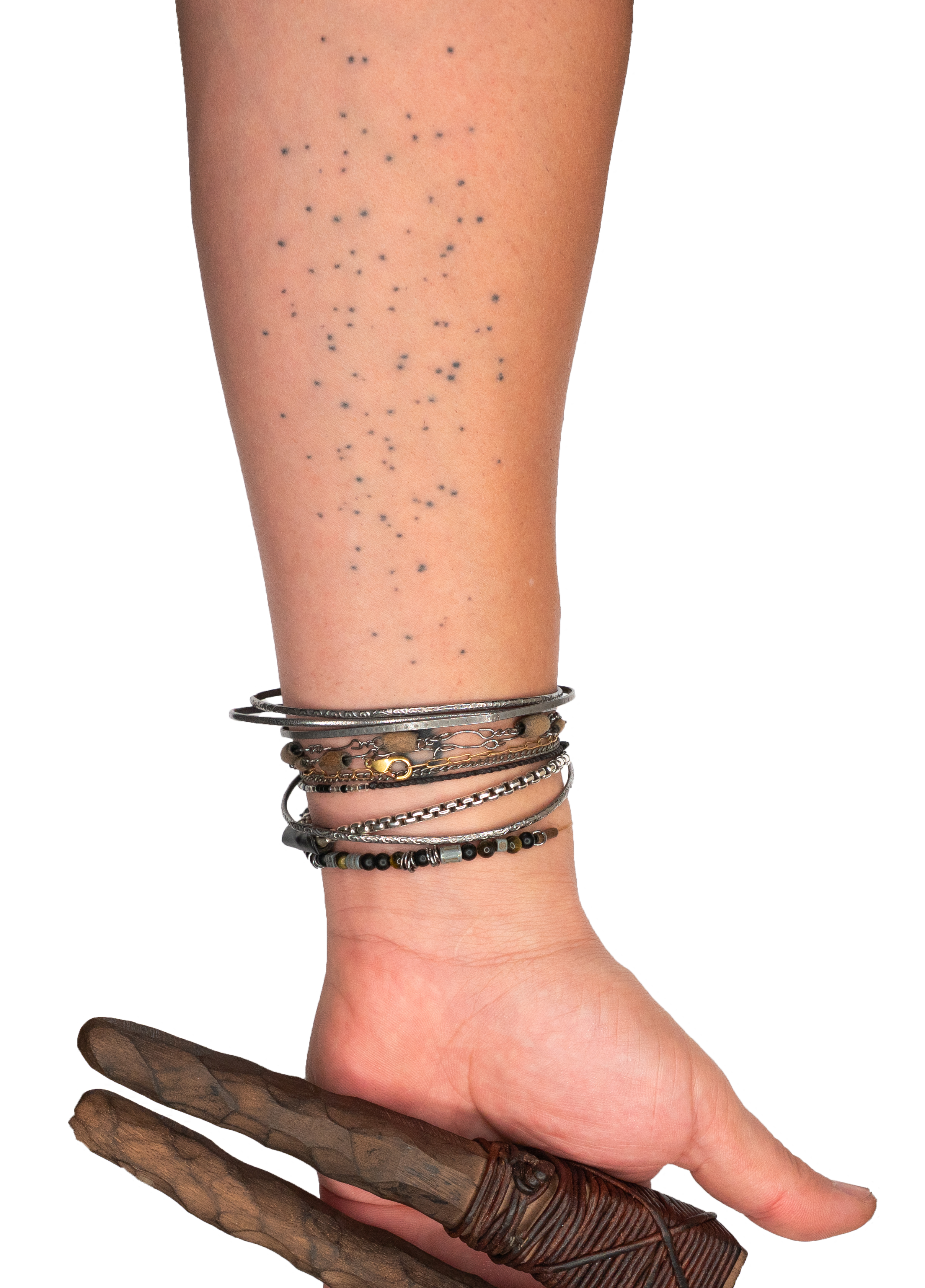 Arm with tattoo dots